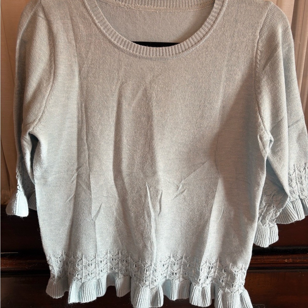 Light Blue Knit Top with Ruffle Detail